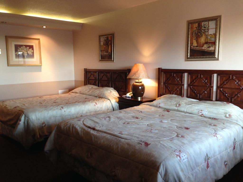Traveller'S Inn Досон-Крик Номер фото